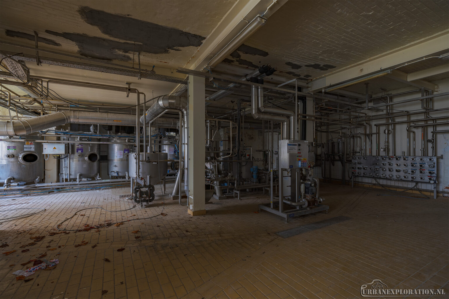 Interior of an abandoned brewery photographed during urban exploration