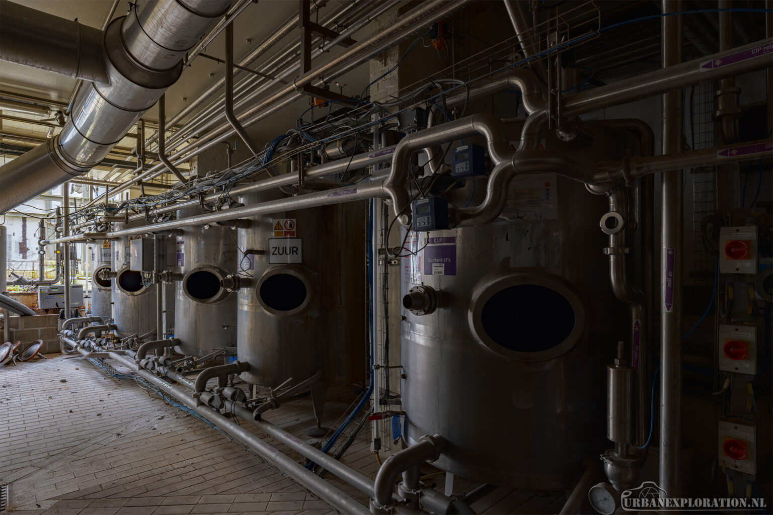 Interior of an abandoned brewery photographed during urban exploration