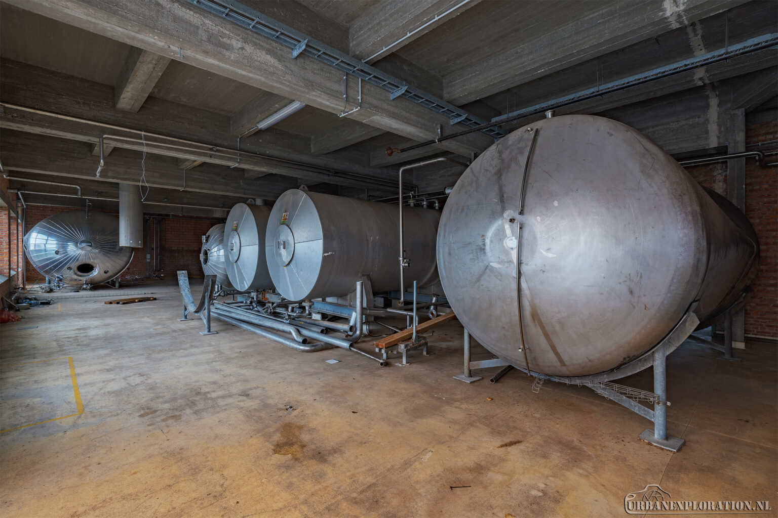 Interior of an abandoned brewery photographed during urban exploration