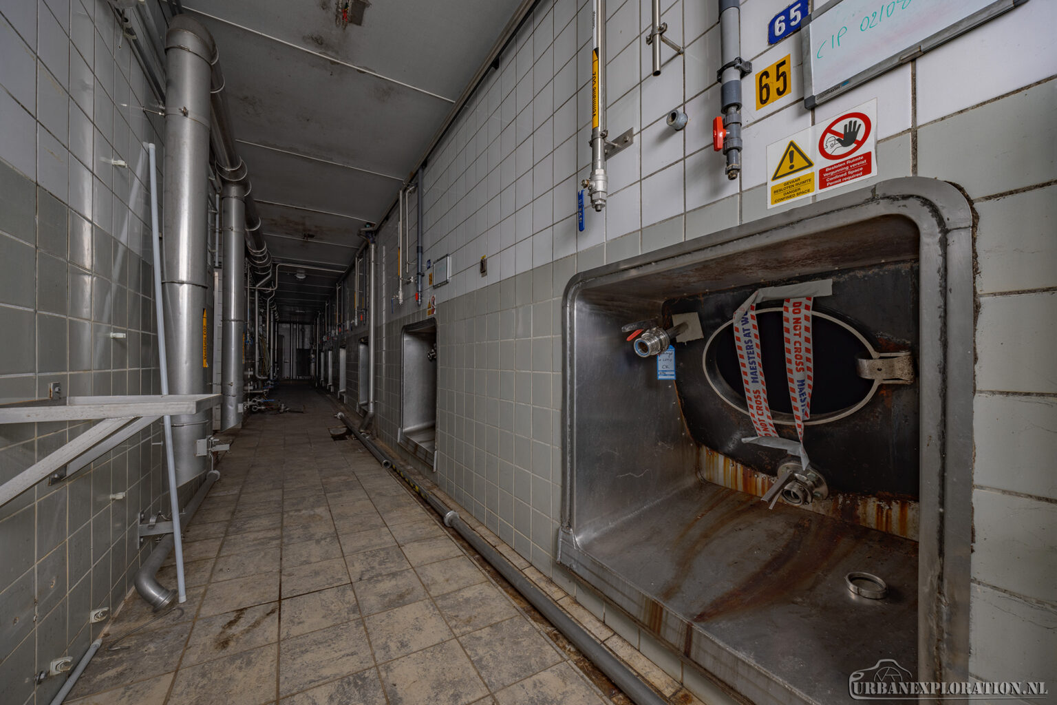Interior of an abandoned brewery photographed during urban exploration