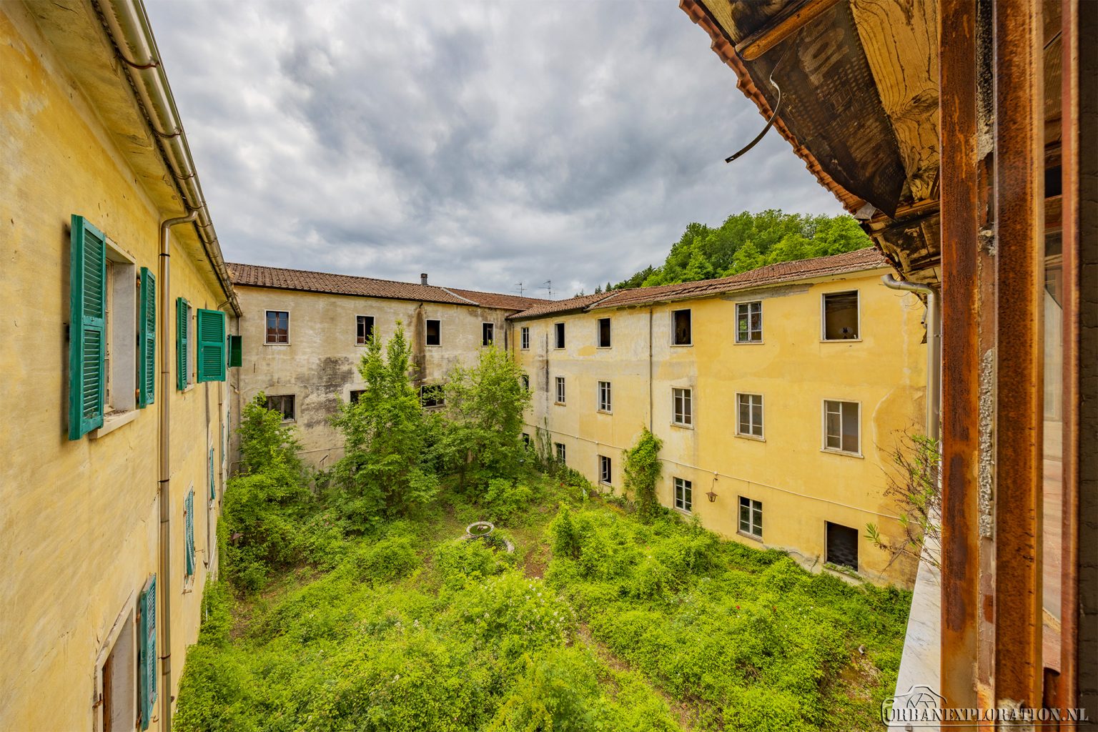 Abandoned monastery school complex with church and classrooms